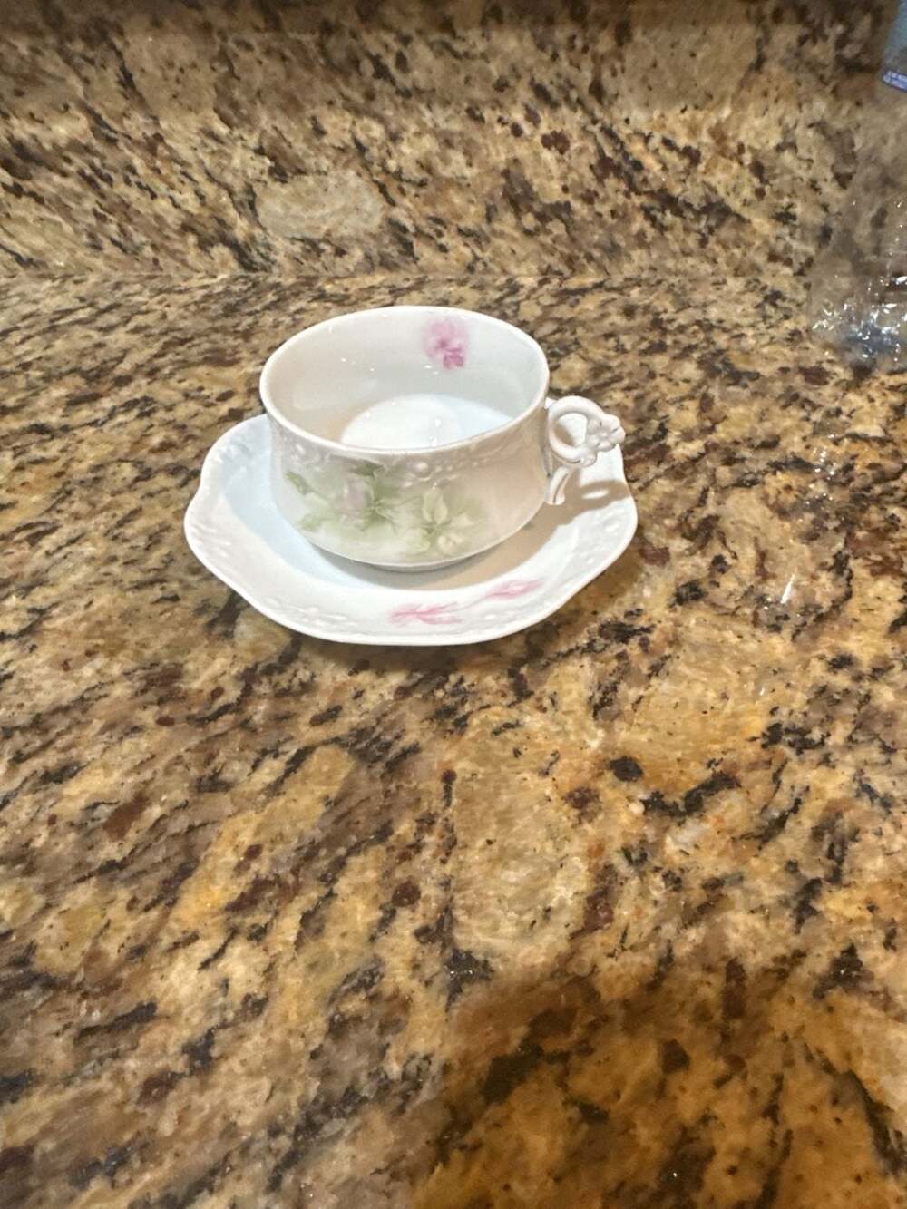Vintage Floral Porcelain Tea Cup And Saucer With Flower Handle